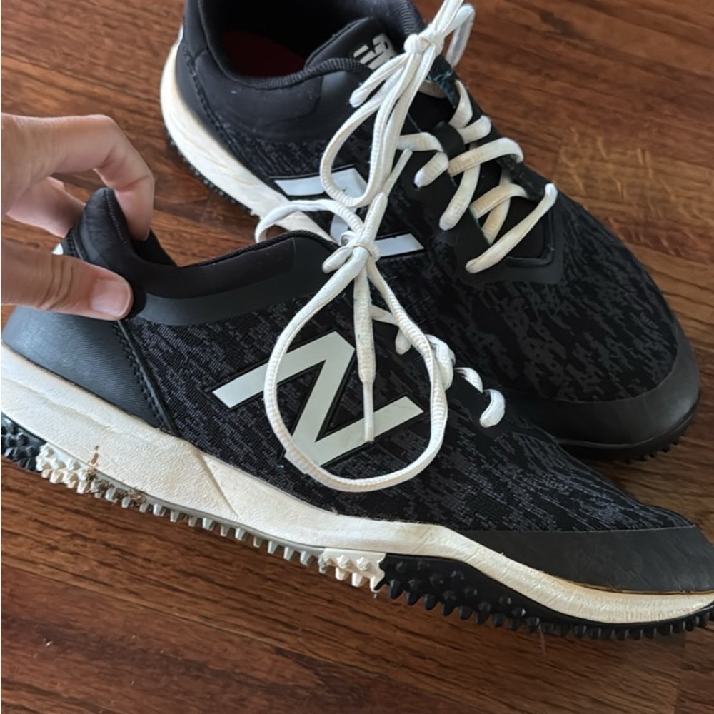 New Balance Black and White turf Shoes with Cushioned Sole